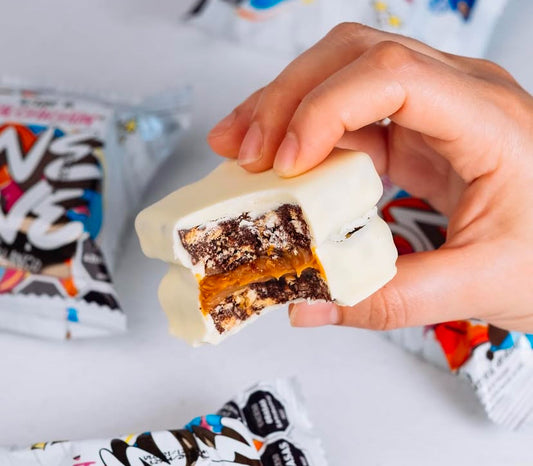 Alfajor Salchichón de Chocolate. Bañado chocolate blanco. Punta Ballena